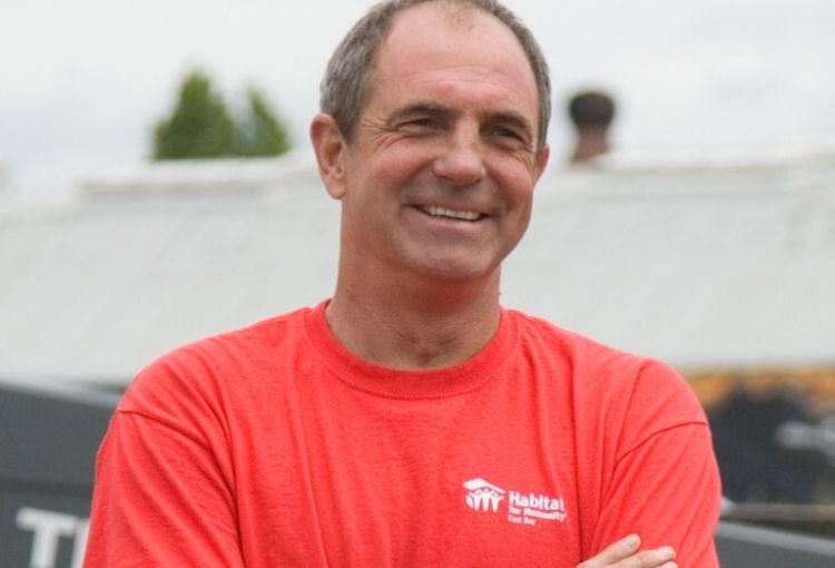 Dave, Habitat's former Construction Director, smiles on the construction site