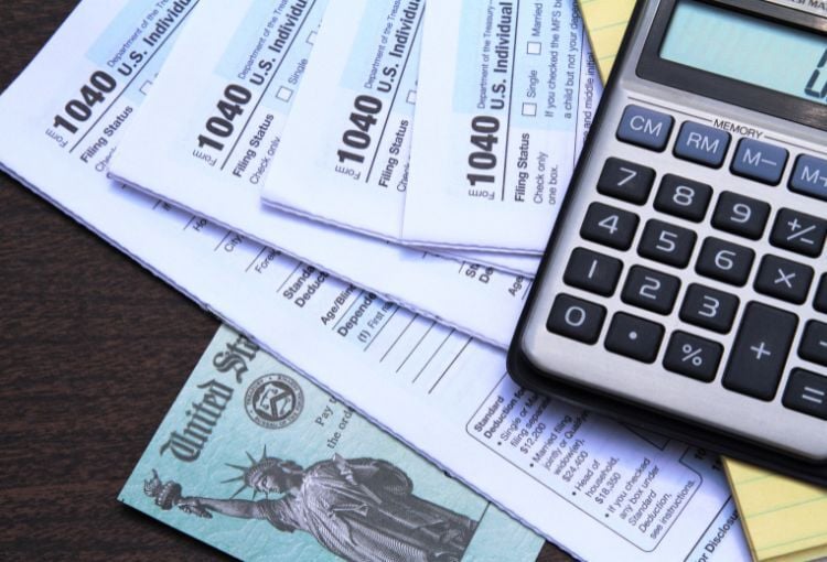 tax forms and a calculator