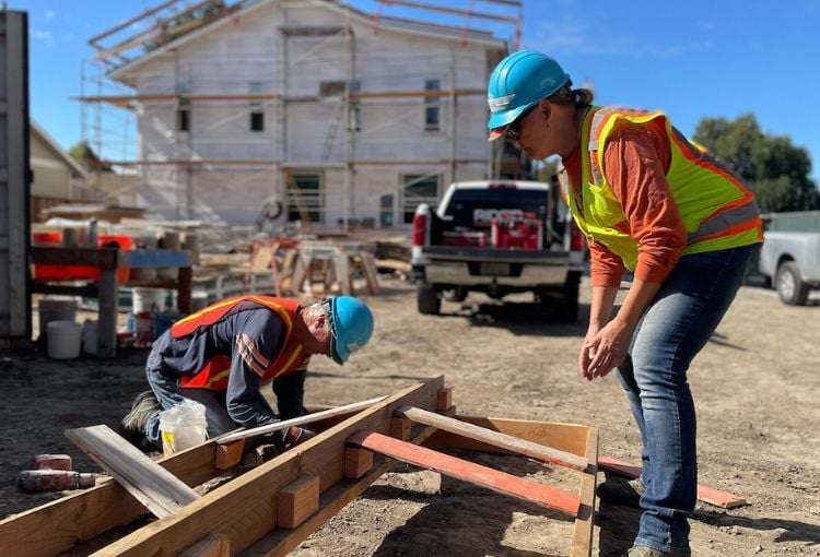 Two volunteers working at Sequoia Grove