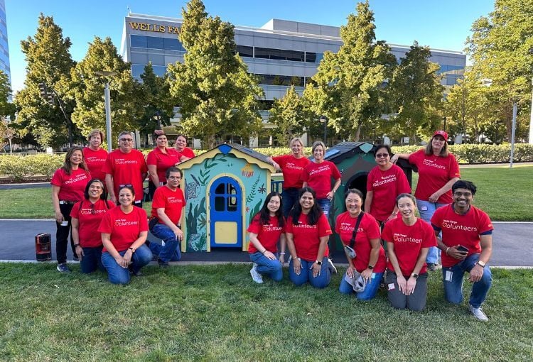 Wells Fargo employees with a playhouse