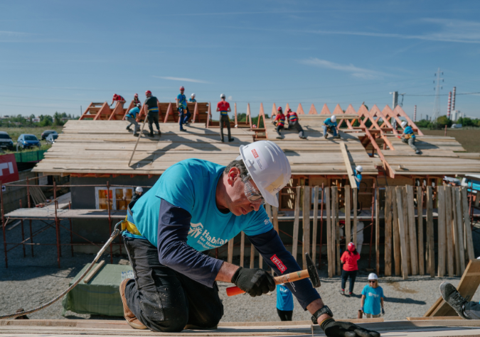 Habitat for Humanity volunteer building in Romania