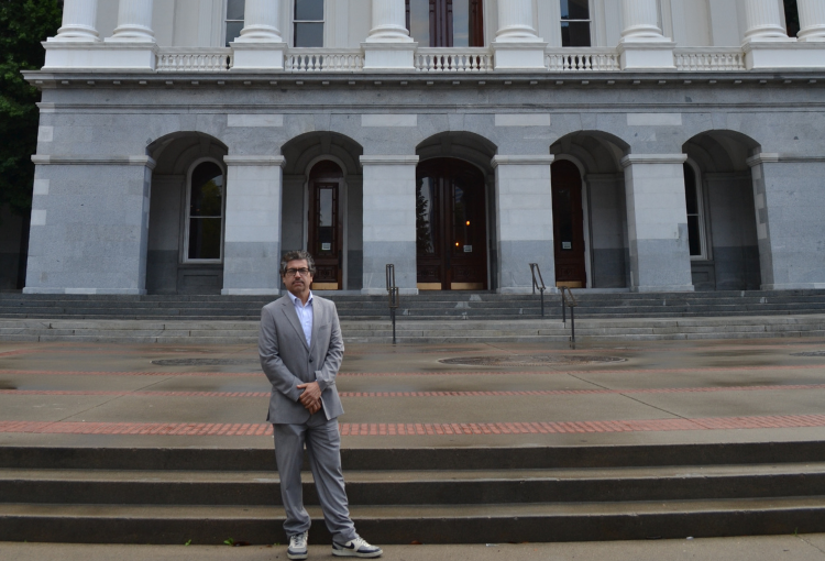 Guillermo stands on the steps of the California State Capitol