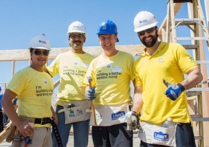 EY employees on a Habitat for Humanity build site