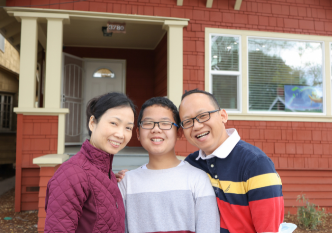 Habitat family in front of their home in Oakland, California