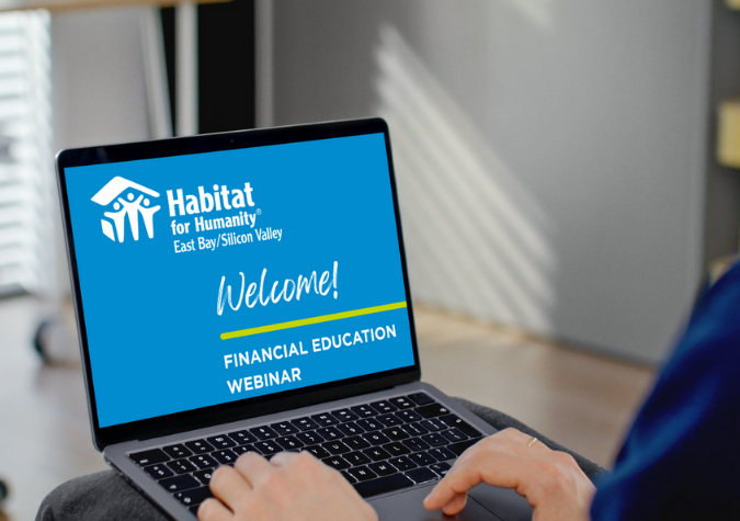 Someone attending a webinar online