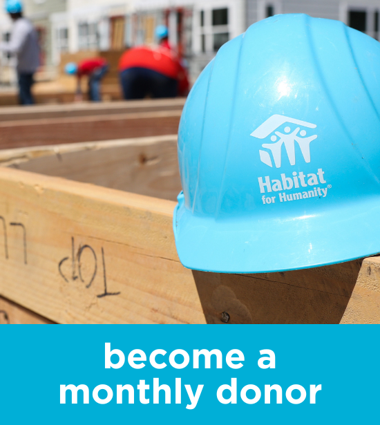 Habitat Hard Hat on a Construction Site with text 